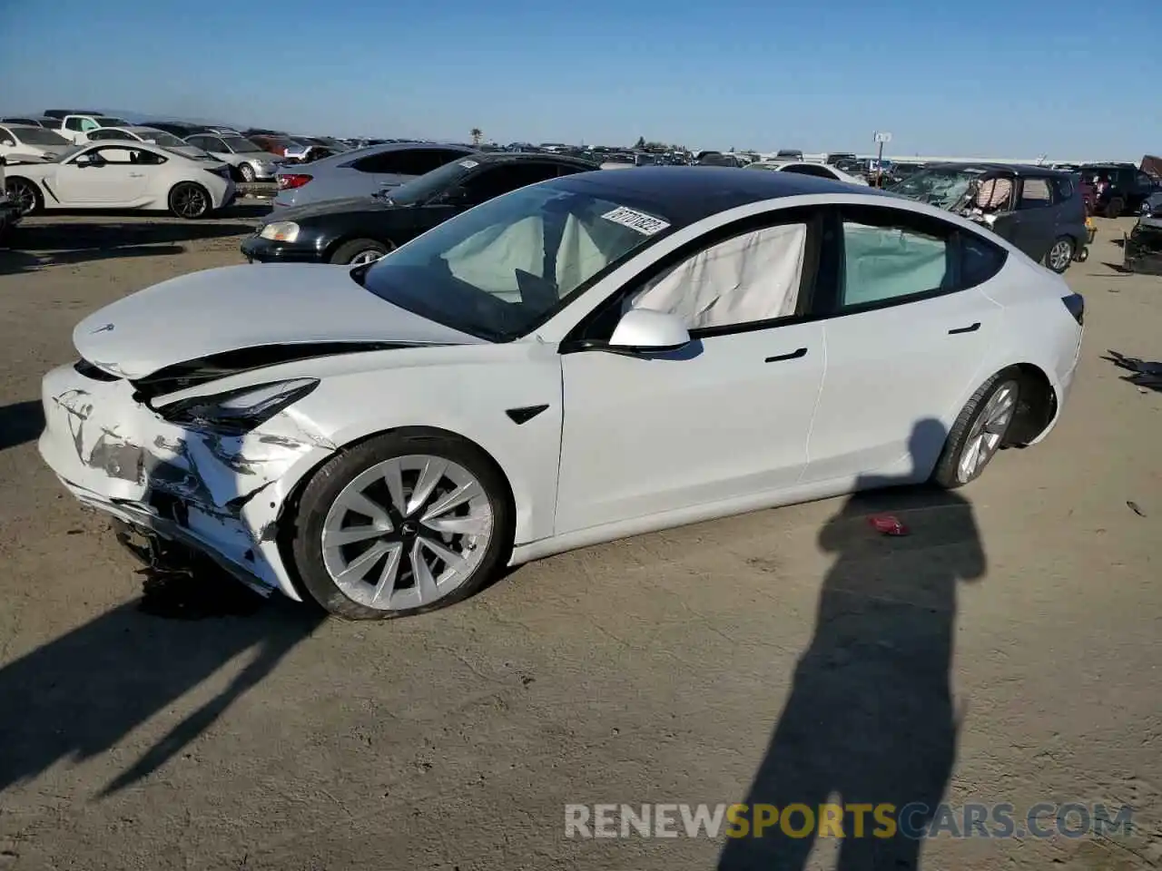 1 Photograph of a damaged car 5YJ3E1EA0NF103210 TESLA MODEL 3 2022