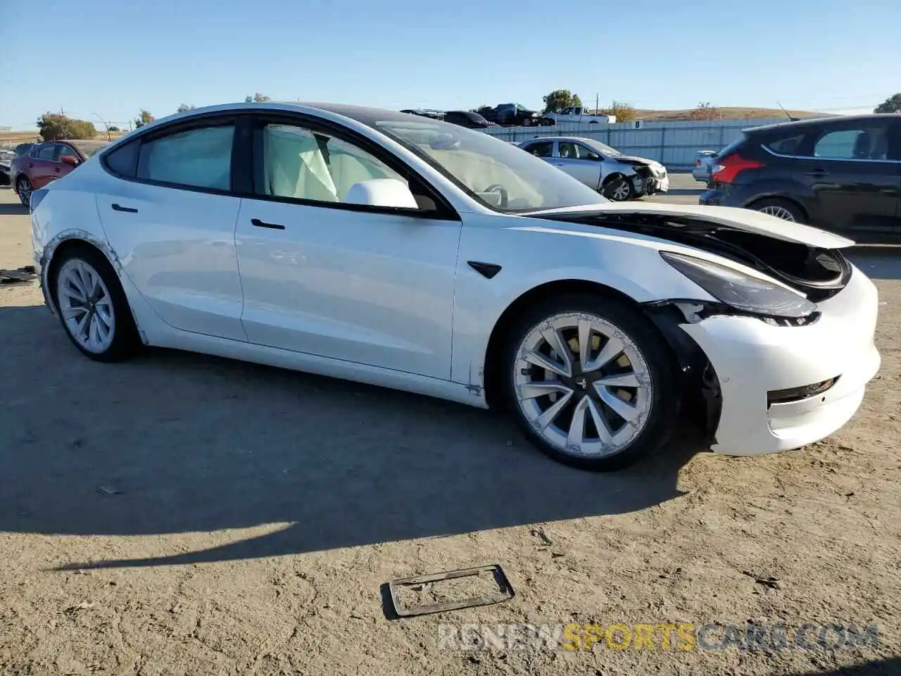 4 Photograph of a damaged car 5YJ3E1EA0NF103210 TESLA MODEL 3 2022