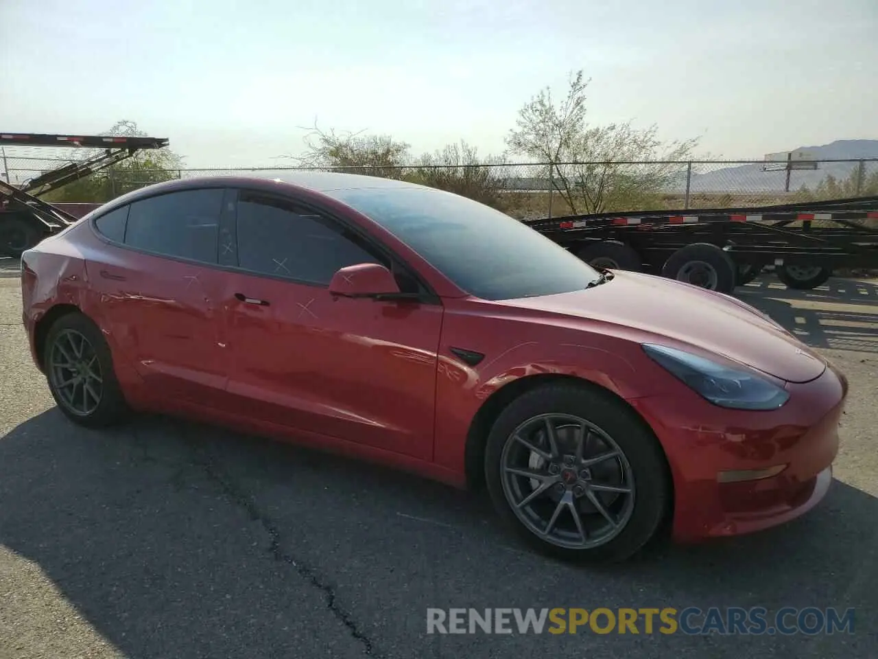 4 Photograph of a damaged car 5YJ3E1EA0NF115227 TESLA MODEL 3 2022