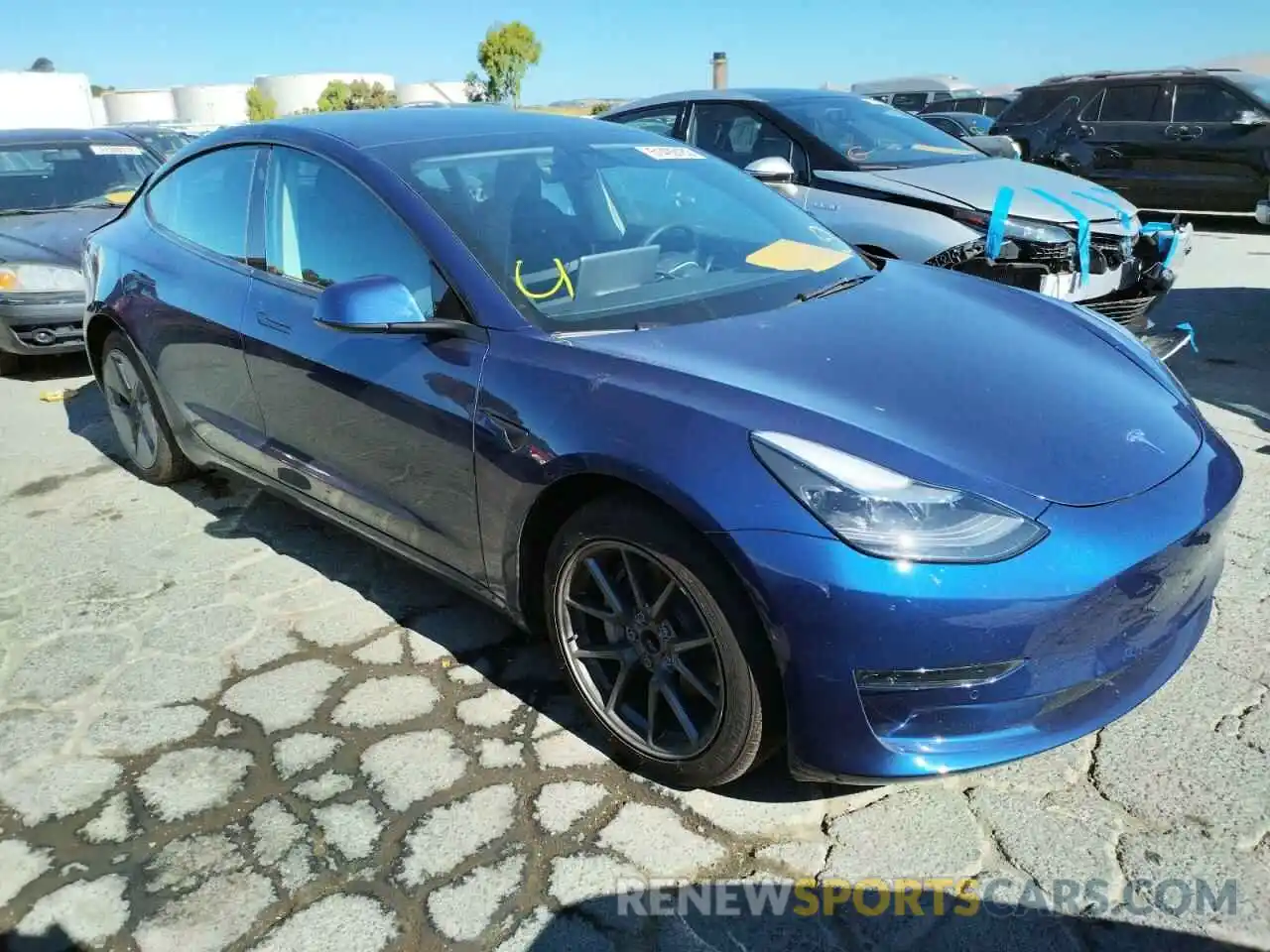 1 Photograph of a damaged car 5YJ3E1EA0NF148163 TESLA MODEL 3 2022