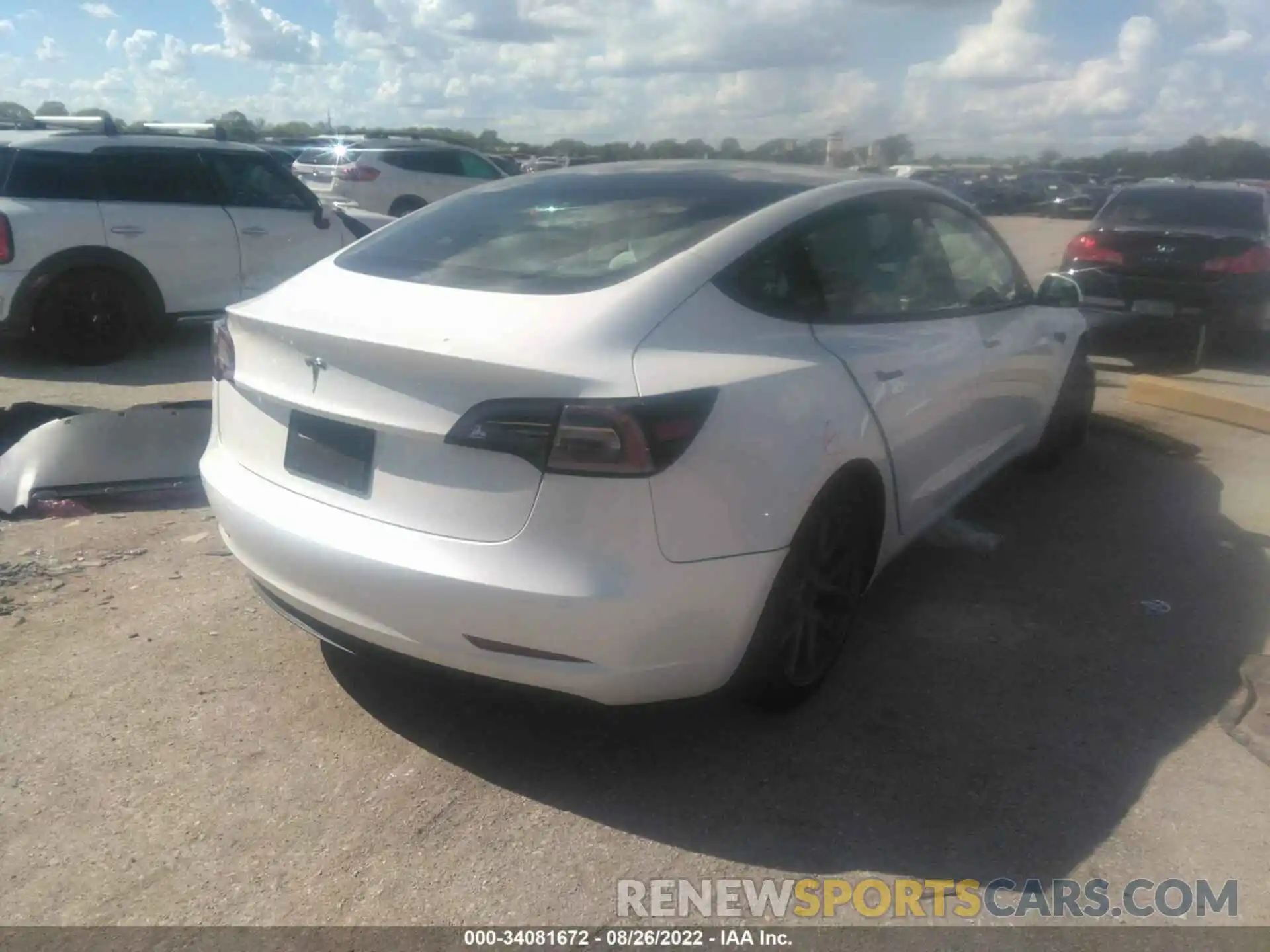 4 Photograph of a damaged car 5YJ3E1EA0NF153444 TESLA MODEL 3 2022