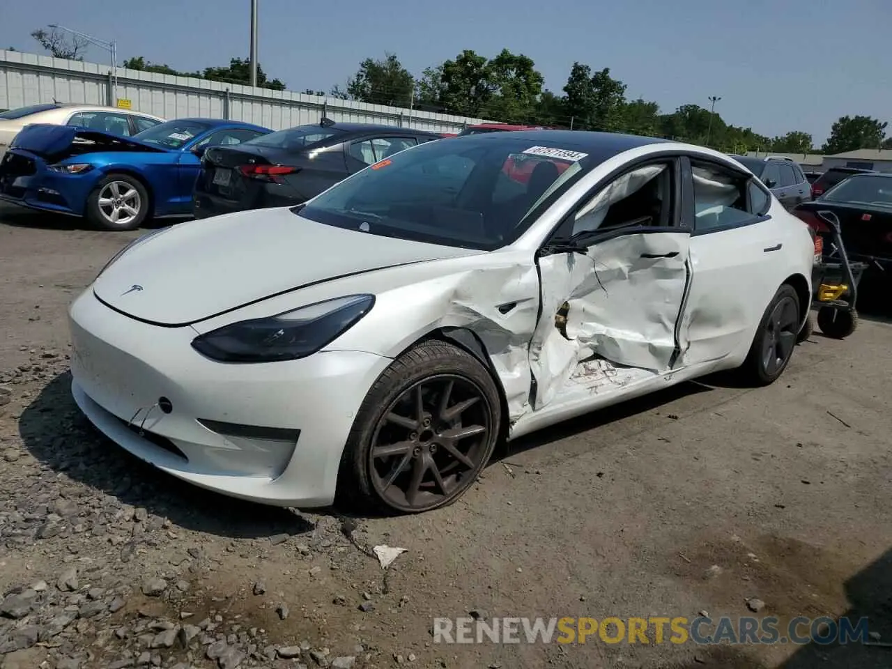 1 Photograph of a damaged car 5YJ3E1EA0NF156411 TESLA MODEL 3 2022