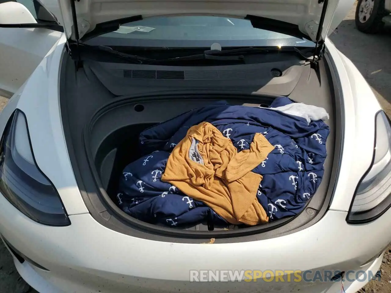 11 Photograph of a damaged car 5YJ3E1EA0NF156411 TESLA MODEL 3 2022