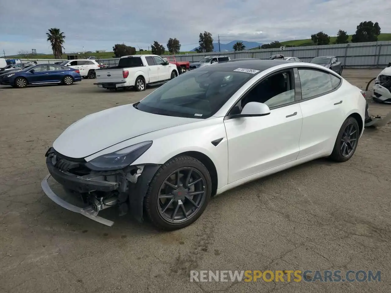 1 Photograph of a damaged car 5YJ3E1EA0NF160989 TESLA MODEL 3 2022