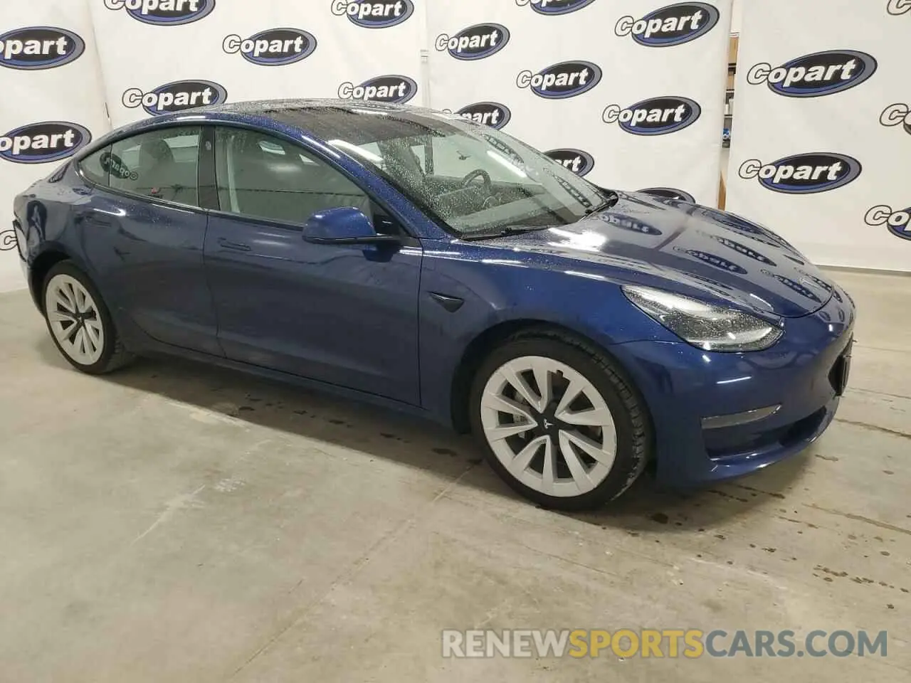 4 Photograph of a damaged car 5YJ3E1EA0NF184970 TESLA MODEL 3 2022