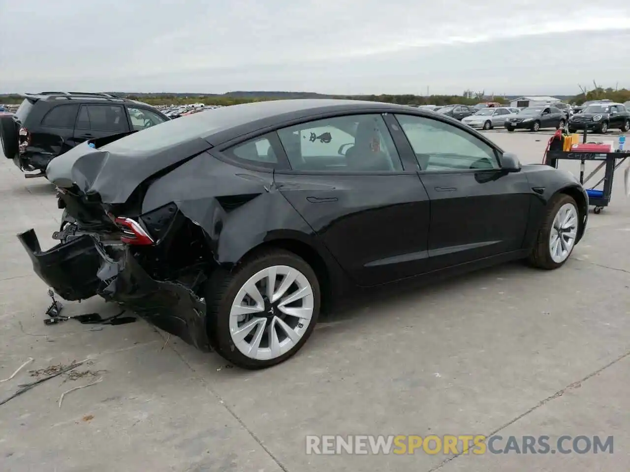 3 Photograph of a damaged car 5YJ3E1EA0NF185200 TESLA MODEL 3 2022