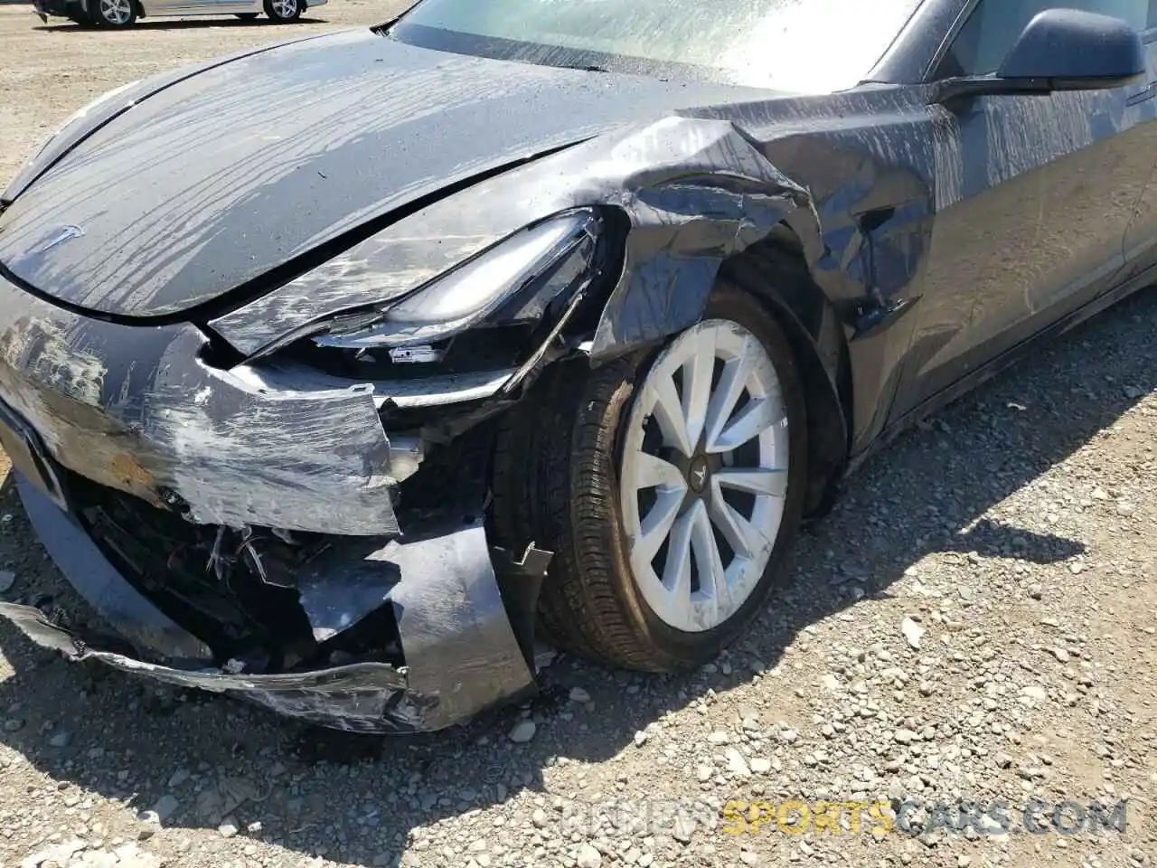 9 Photograph of a damaged car 5YJ3E1EA0NF192065 TESLA MODEL 3 2022