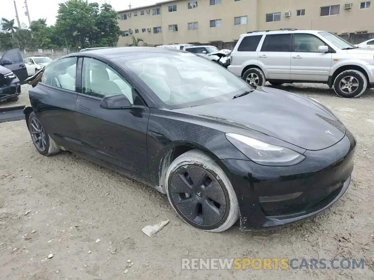 4 Photograph of a damaged car 5YJ3E1EA0NF204795 TESLA MODEL 3 2022