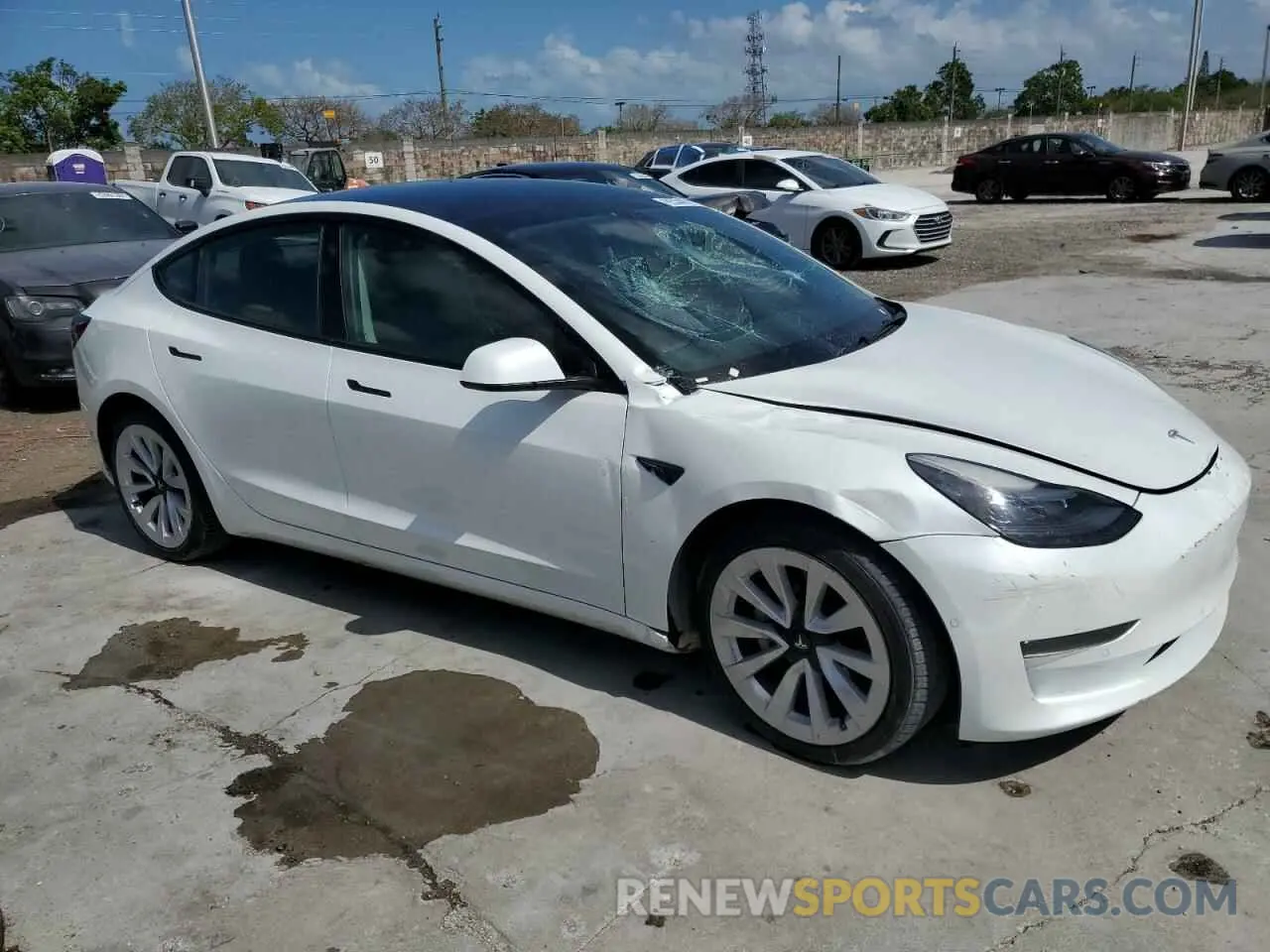 4 Photograph of a damaged car 5YJ3E1EA0NF287788 TESLA MODEL 3 2022