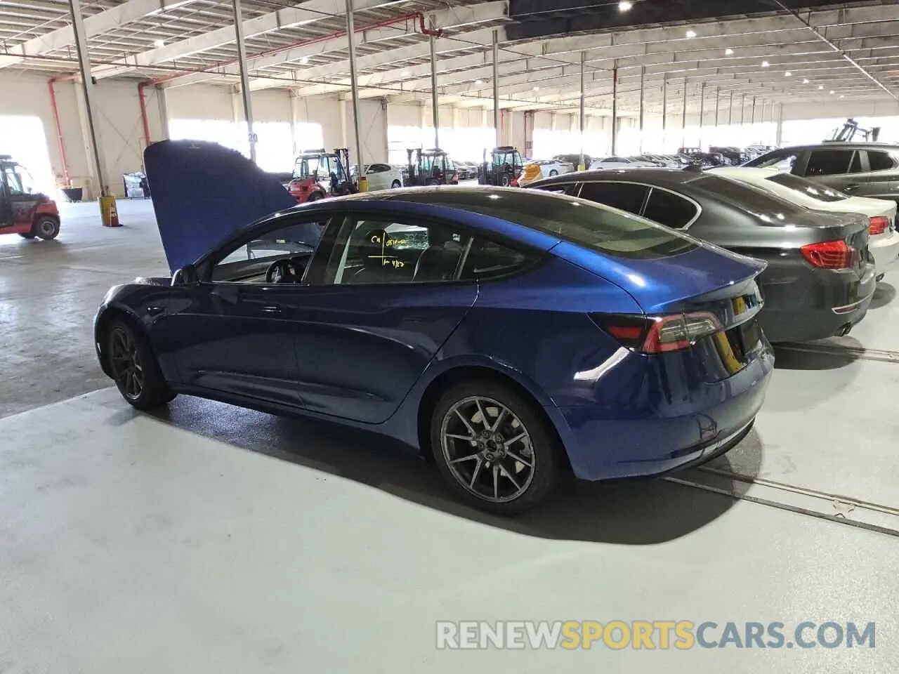 2 Photograph of a damaged car 5YJ3E1EA0NF290058 TESLA MODEL 3 2022