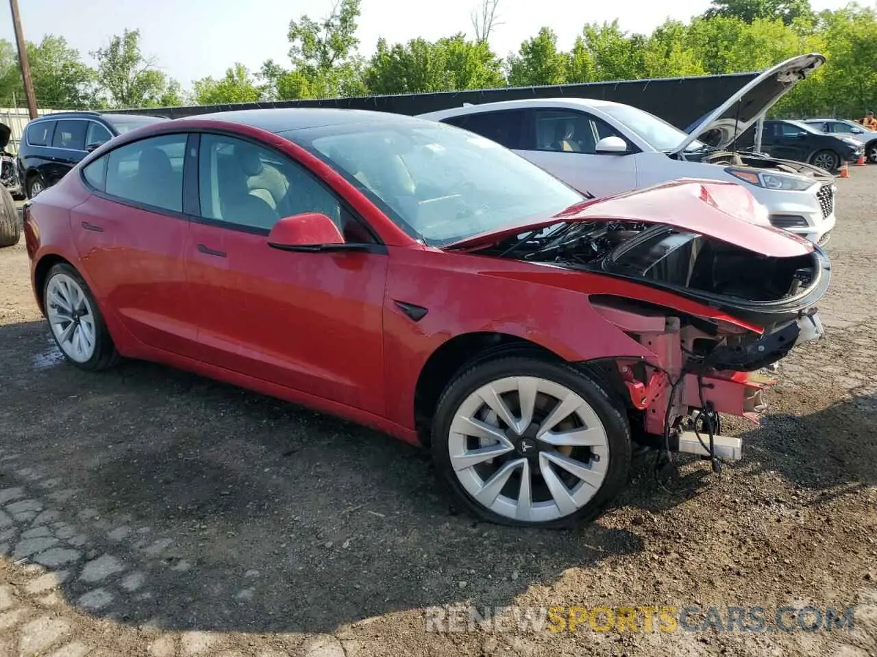 4 Photograph of a damaged car 5YJ3E1EA0NF304413 TESLA MODEL 3 2022