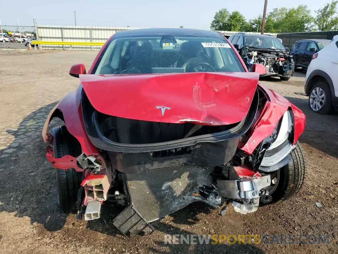 5 Photograph of a damaged car 5YJ3E1EA0NF304413 TESLA MODEL 3 2022