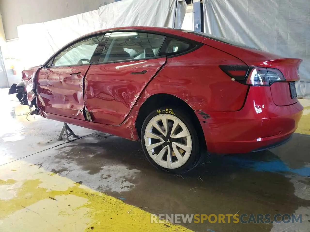 2 Photograph of a damaged car 5YJ3E1EA0NF304427 TESLA MODEL 3 2022