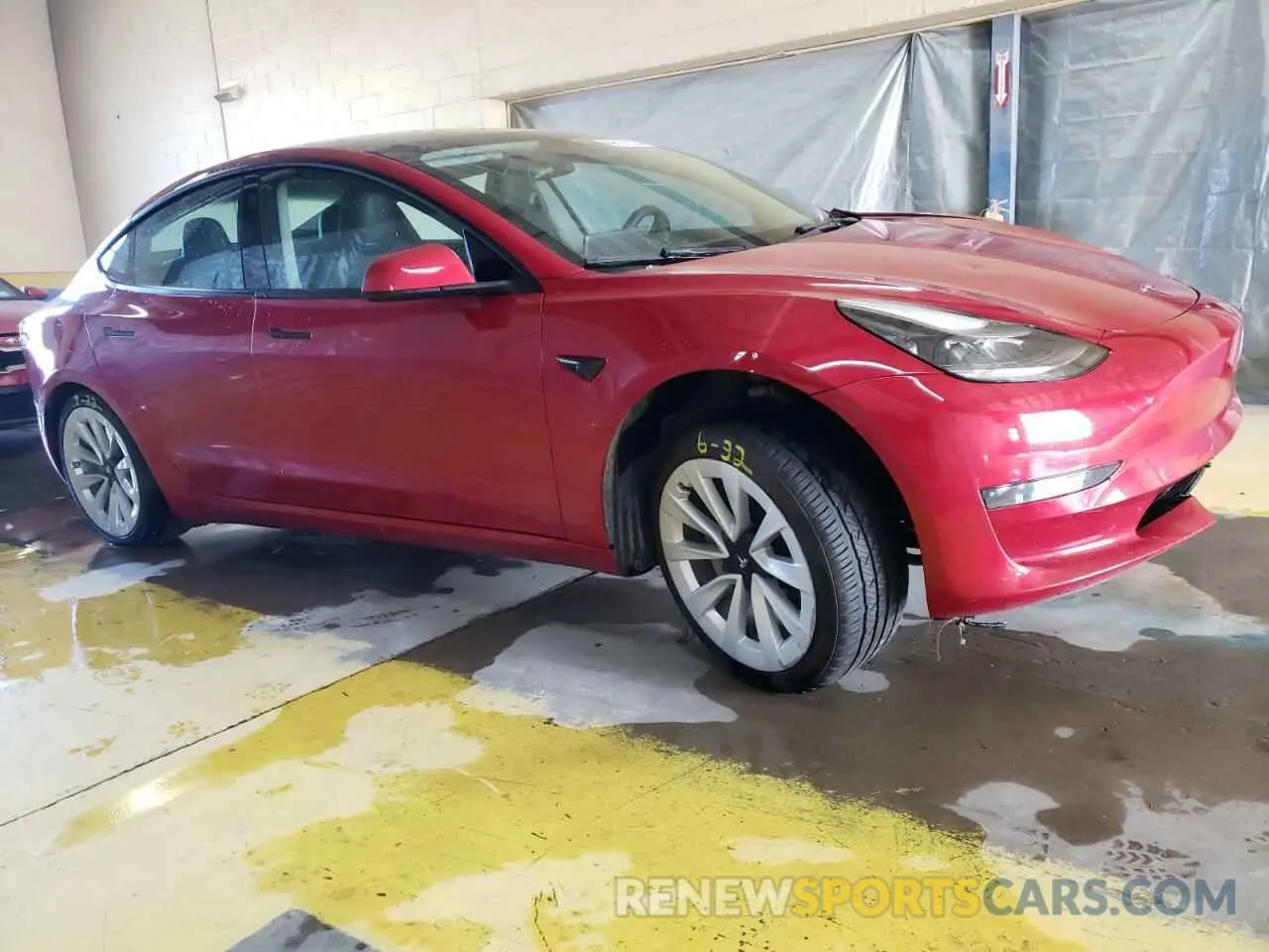 4 Photograph of a damaged car 5YJ3E1EA0NF304427 TESLA MODEL 3 2022