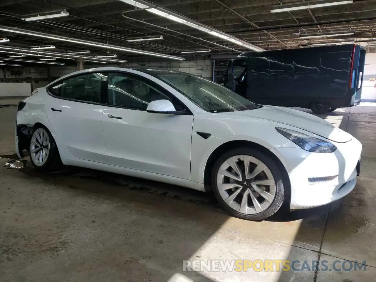 4 Photograph of a damaged car 5YJ3E1EA0NF304640 TESLA MODEL 3 2022