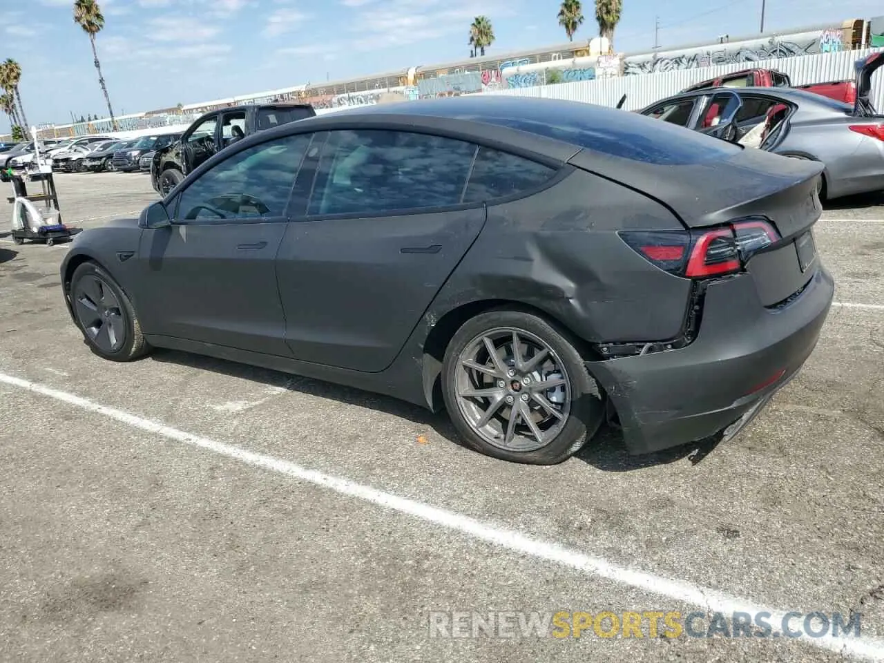2 Photograph of a damaged car 5YJ3E1EA0NF320370 TESLA MODEL 3 2022