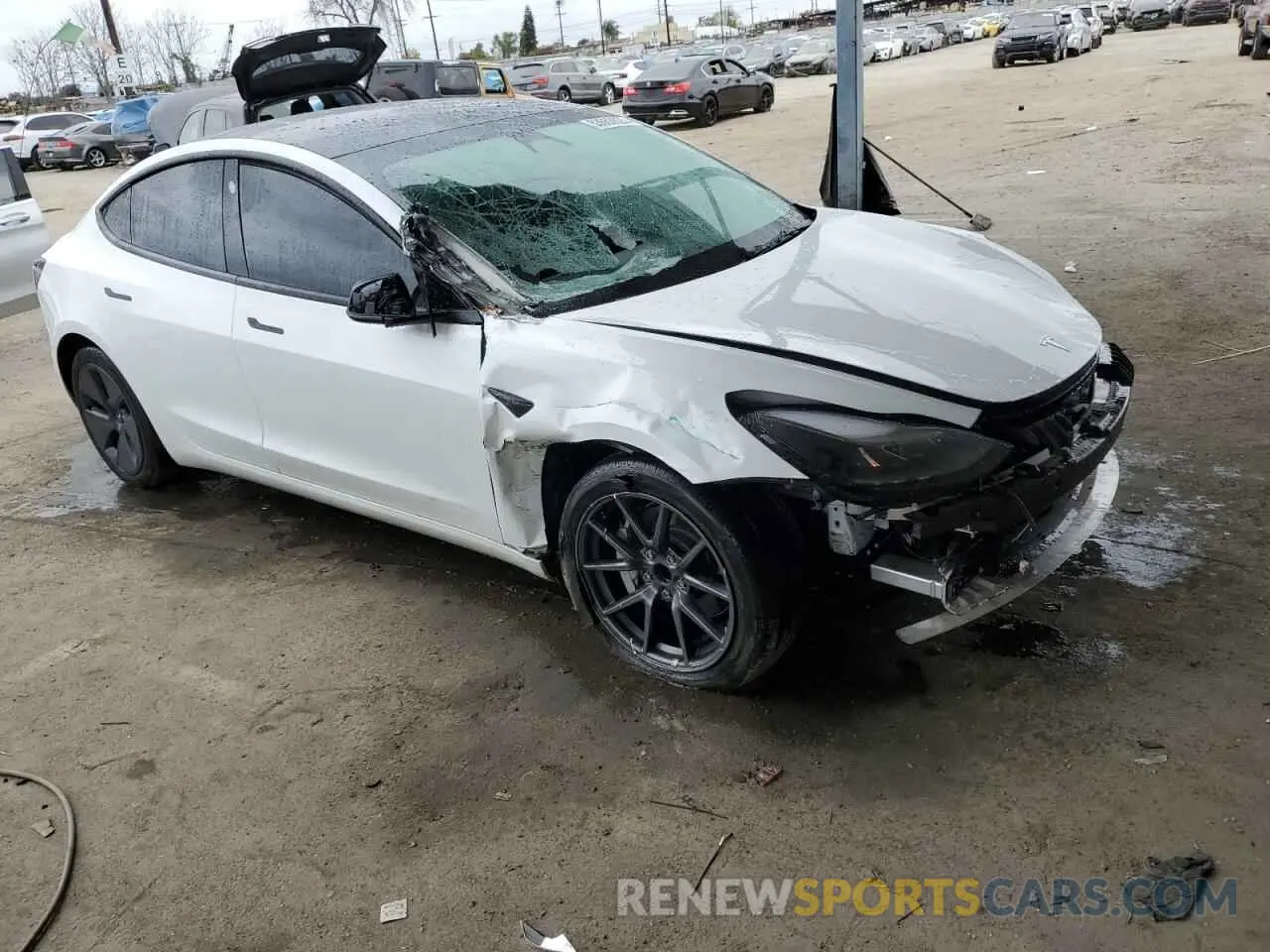 4 Photograph of a damaged car 5YJ3E1EA0NF325889 TESLA MODEL 3 2022