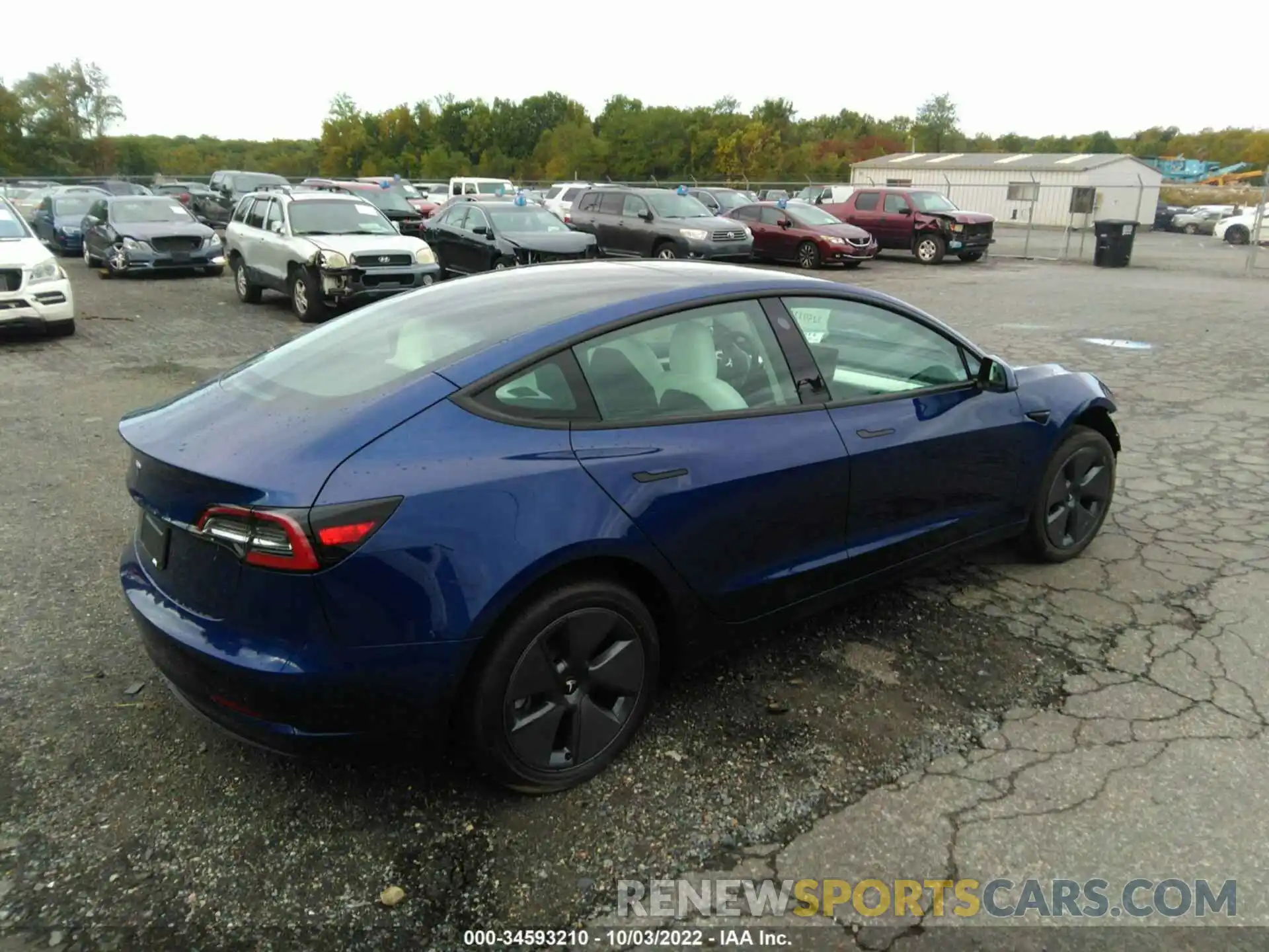 4 Photograph of a damaged car 5YJ3E1EA0NF332017 TESLA MODEL 3 2022