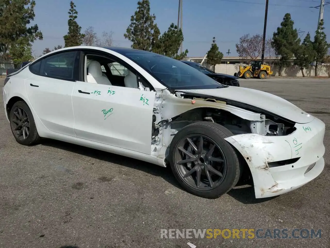 4 Photograph of a damaged car 5YJ3E1EA0NF360111 TESLA MODEL 3 2022