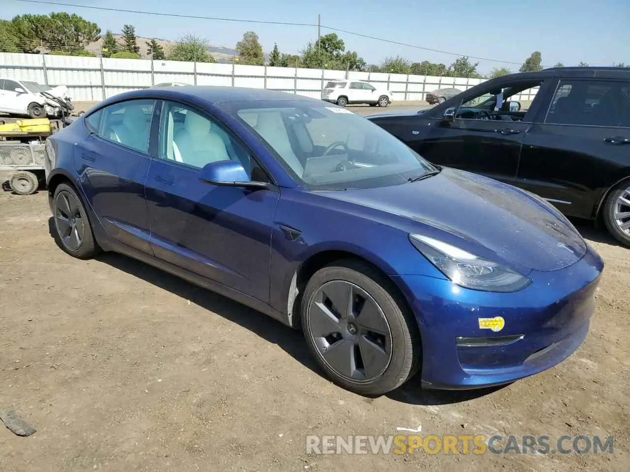 4 Photograph of a damaged car 5YJ3E1EA0NF361050 TESLA MODEL 3 2022