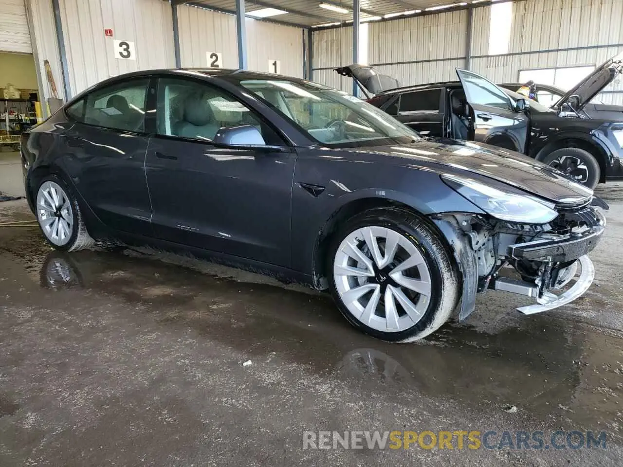 4 Photograph of a damaged car 5YJ3E1EA0NF370332 TESLA MODEL 3 2022