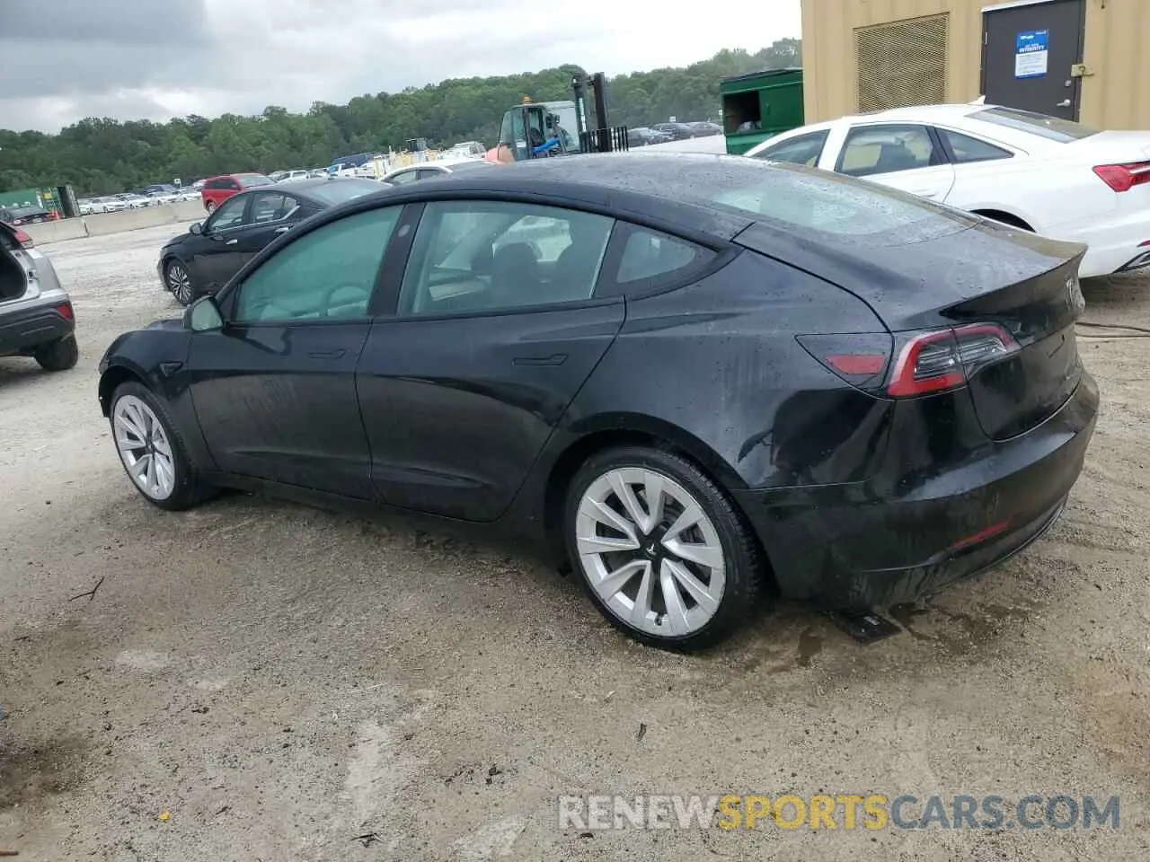 2 Photograph of a damaged car 5YJ3E1EA0NF372095 TESLA MODEL 3 2022