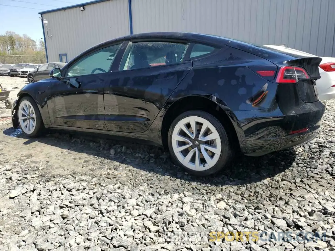 2 Photograph of a damaged car 5YJ3E1EA0NF372436 TESLA MODEL 3 2022
