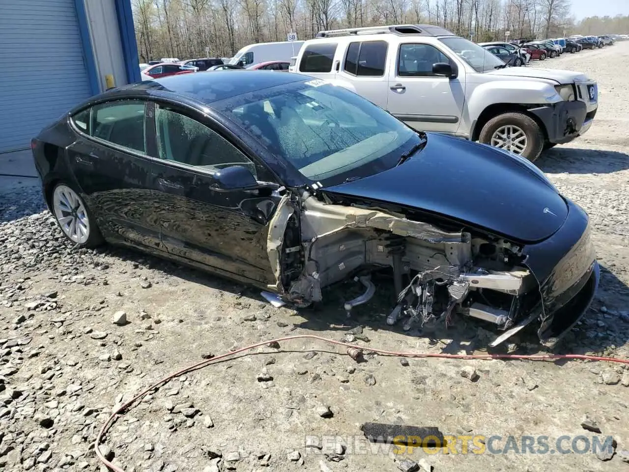 4 Photograph of a damaged car 5YJ3E1EA0NF372436 TESLA MODEL 3 2022