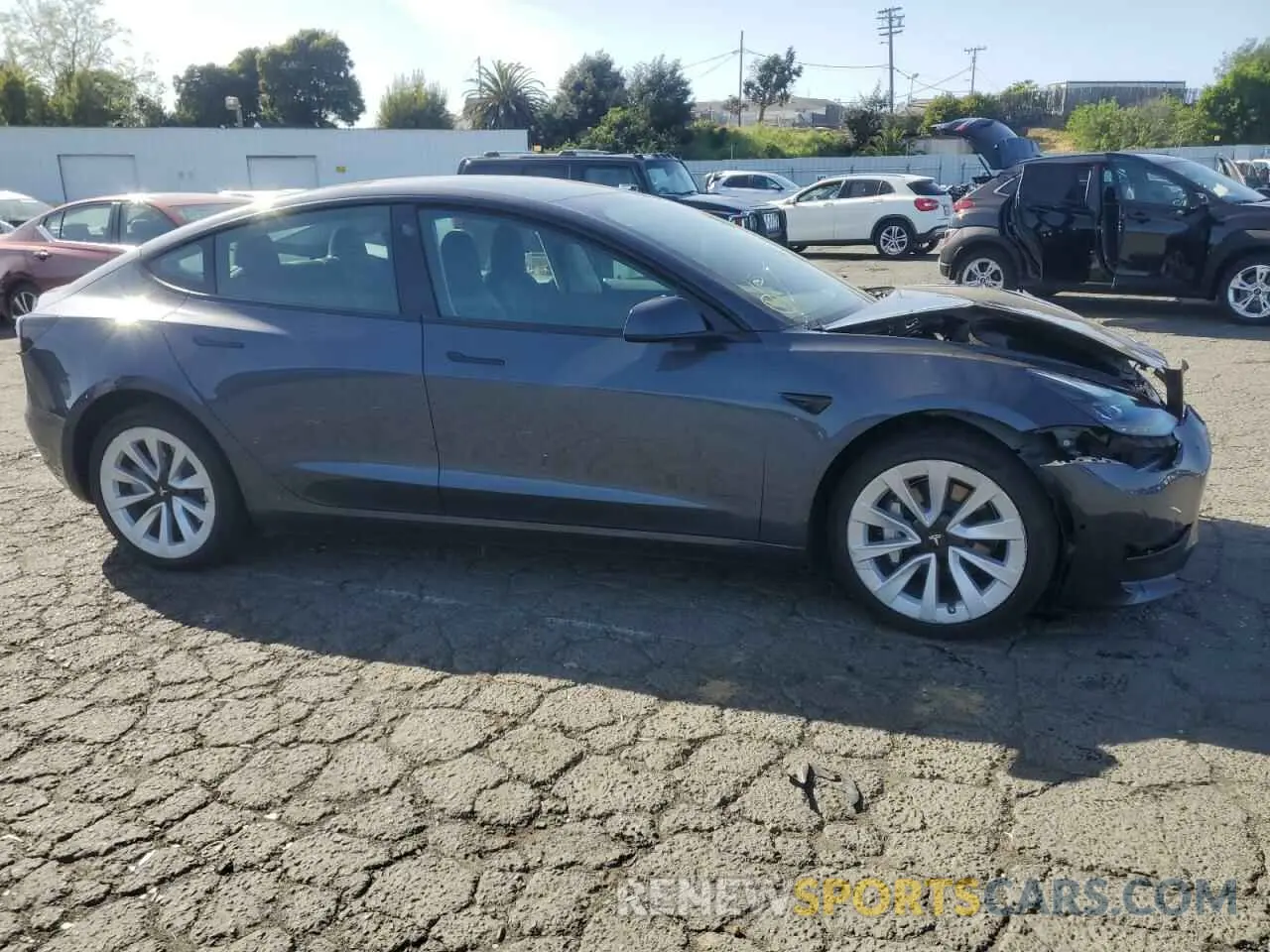 4 Photograph of a damaged car 5YJ3E1EA0NF374560 TESLA MODEL 3 2022