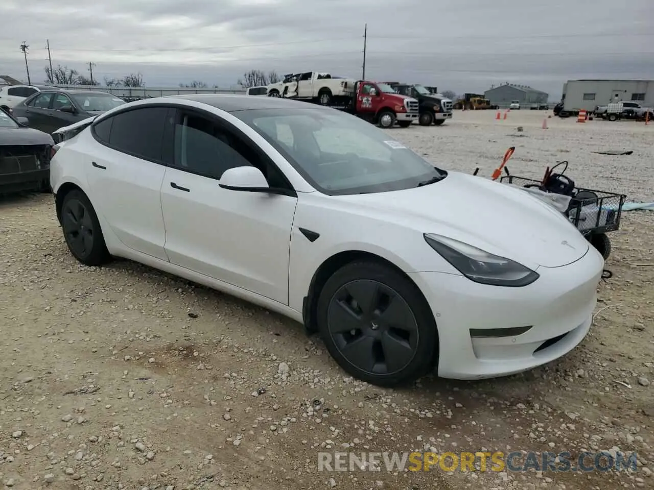 4 Photograph of a damaged car 5YJ3E1EA1NF106469 TESLA MODEL 3 2022