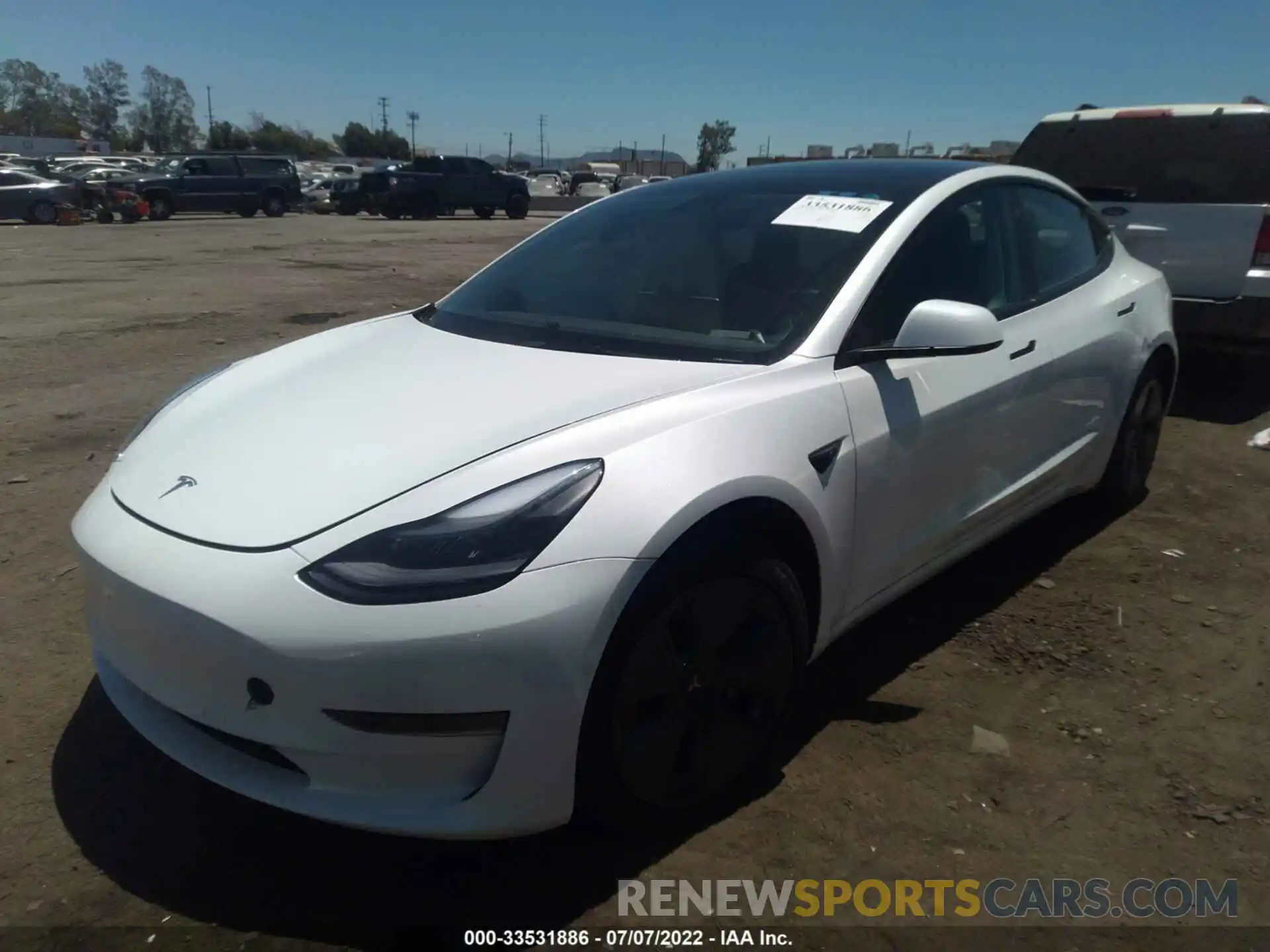 2 Photograph of a damaged car 5YJ3E1EA1NF107105 TESLA MODEL 3 2022