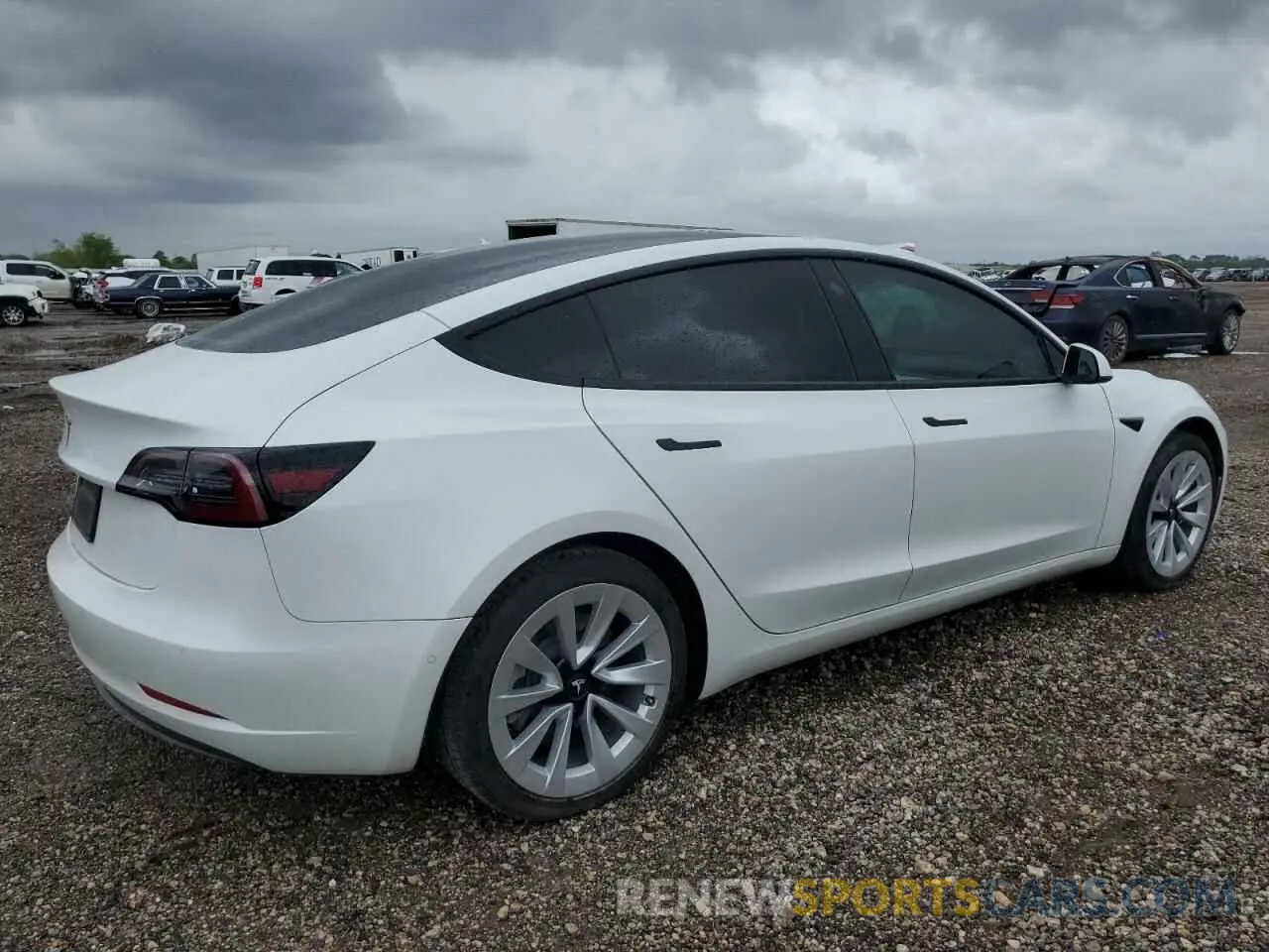 3 Photograph of a damaged car 5YJ3E1EA1NF127158 TESLA MODEL 3 2022