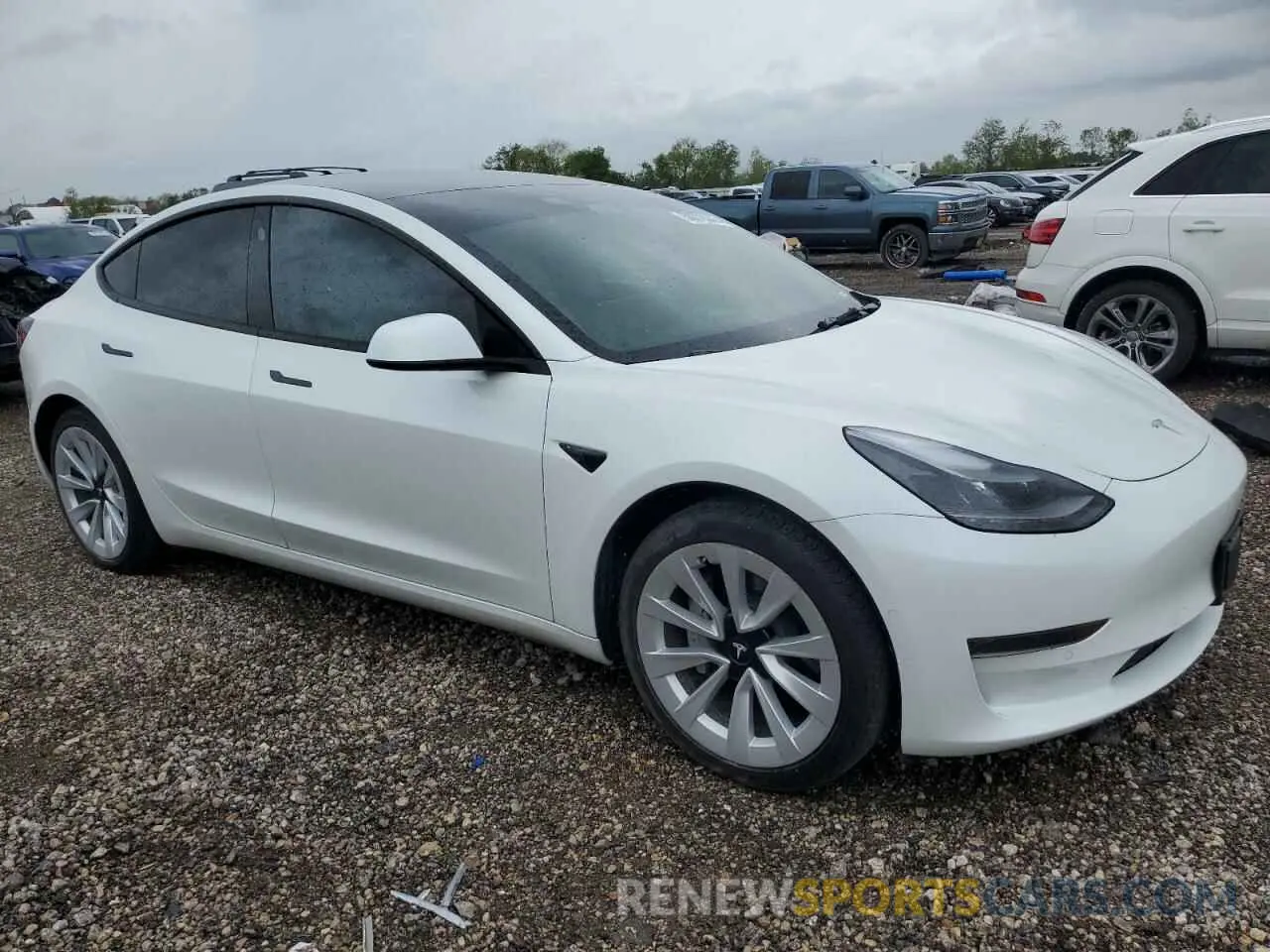 4 Photograph of a damaged car 5YJ3E1EA1NF127158 TESLA MODEL 3 2022