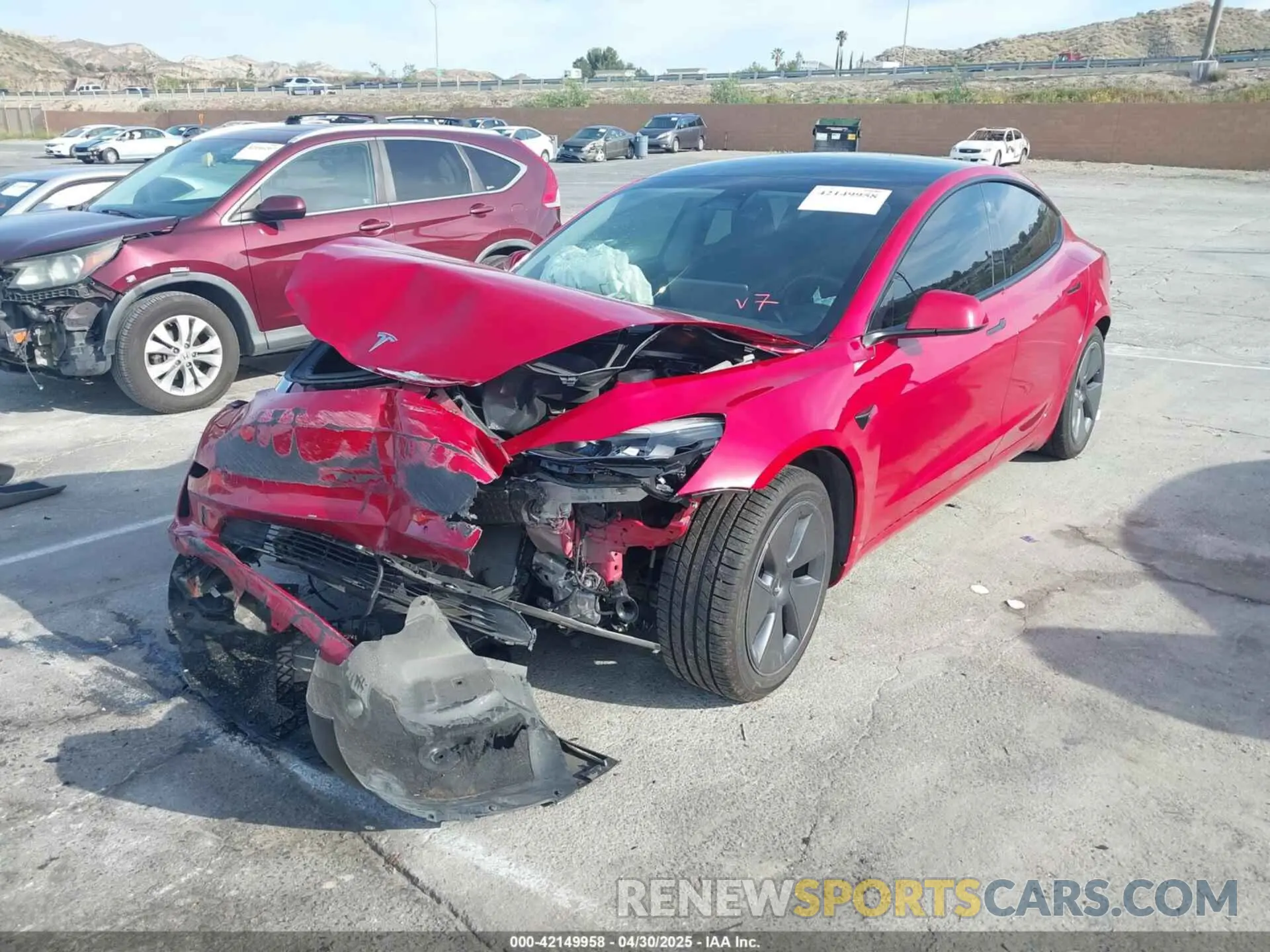 2 Photograph of a damaged car 5YJ3E1EA1NF138984 TESLA MODEL 3 2022