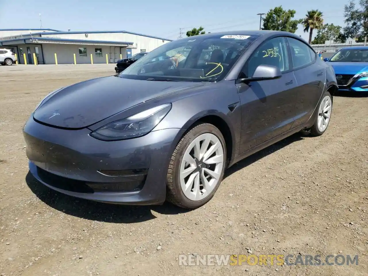 2 Photograph of a damaged car 5YJ3E1EA1NF142968 TESLA MODEL 3 2022