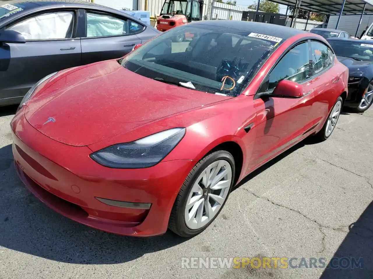 2 Photograph of a damaged car 5YJ3E1EA1NF144140 TESLA MODEL 3 2022