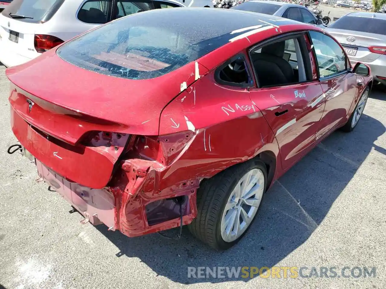 4 Photograph of a damaged car 5YJ3E1EA1NF144140 TESLA MODEL 3 2022