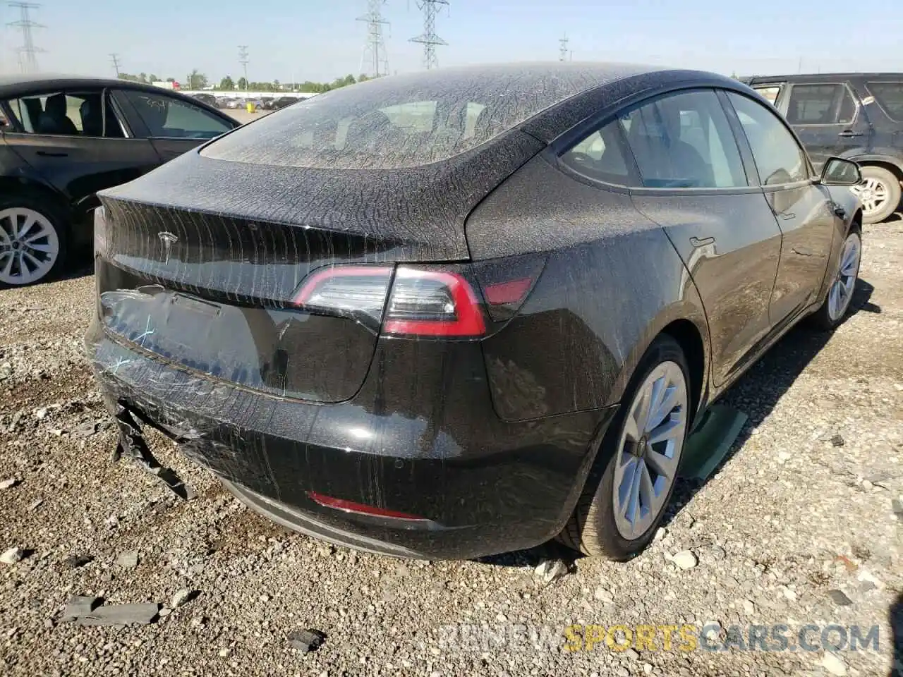 4 Photograph of a damaged car 5YJ3E1EA1NF185190 TESLA MODEL 3 2022