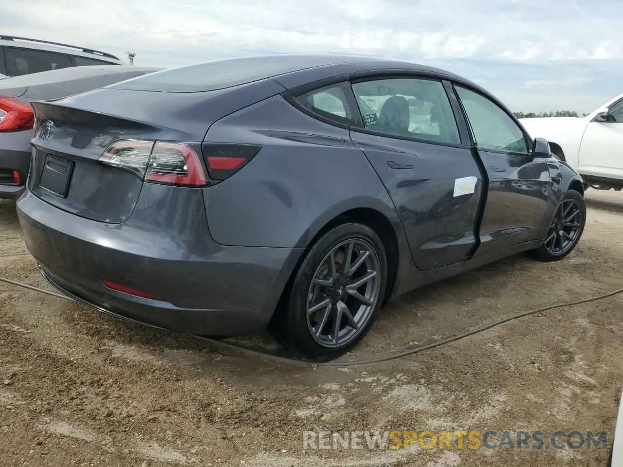3 Photograph of a damaged car 5YJ3E1EA1NF187621 TESLA MODEL 3 2022