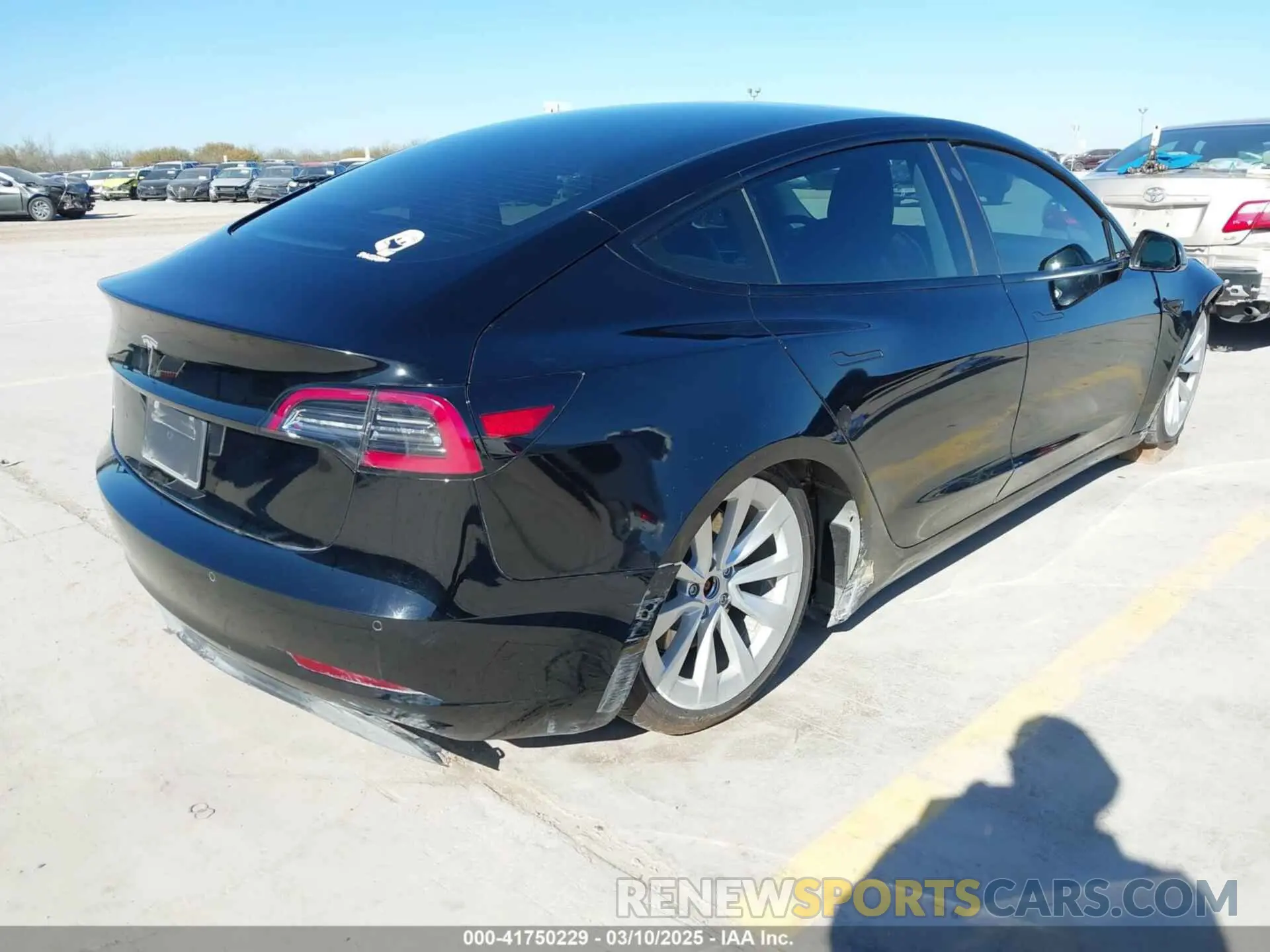 4 Photograph of a damaged car 5YJ3E1EA1NF188638 TESLA MODEL 3 2022