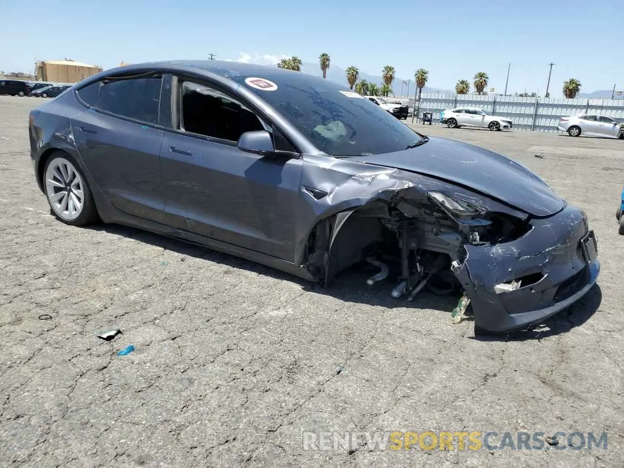 4 Photograph of a damaged car 5YJ3E1EA1NF191426 TESLA MODEL 3 2022