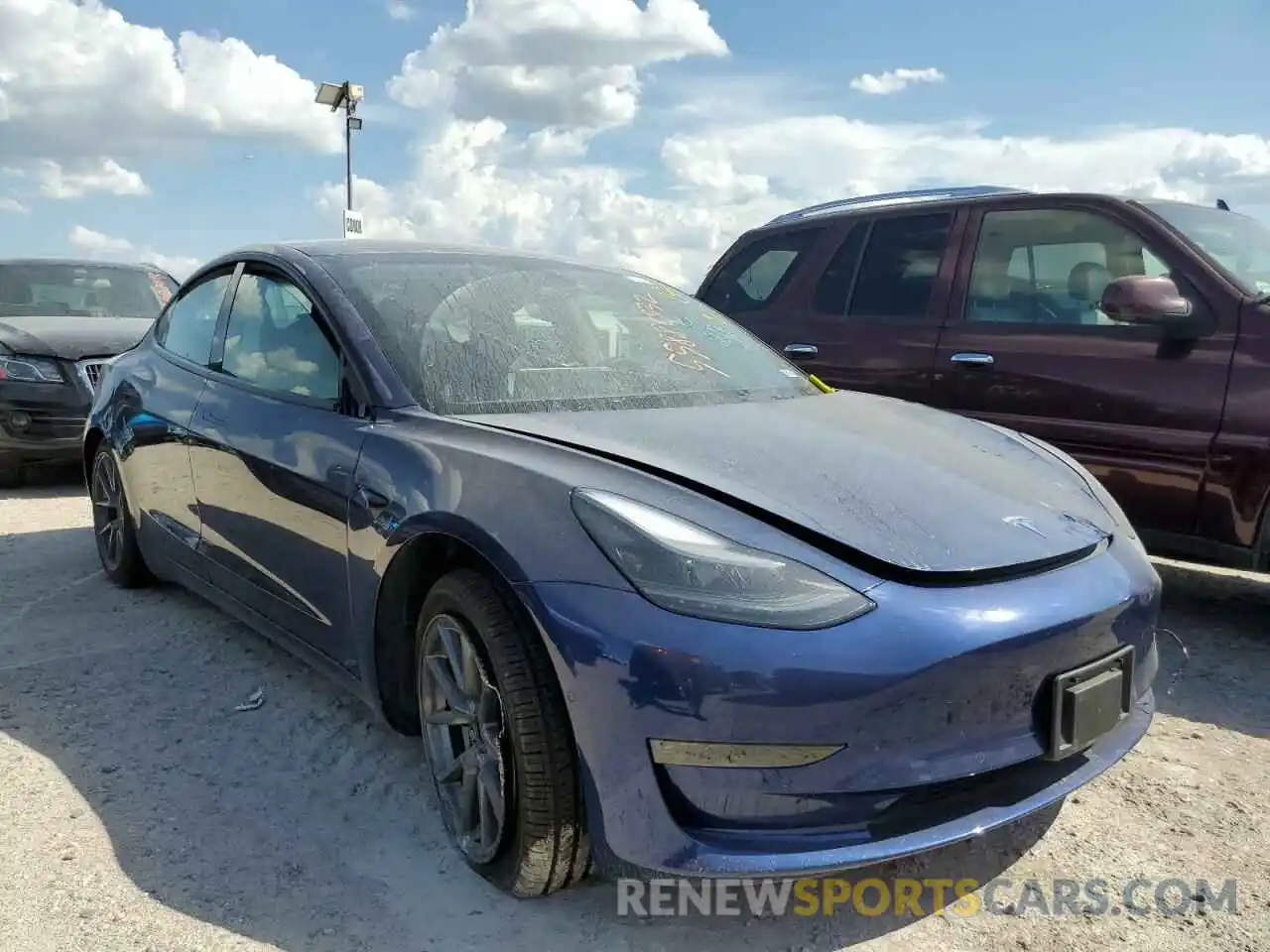 1 Photograph of a damaged car 5YJ3E1EA1NF191829 TESLA MODEL 3 2022