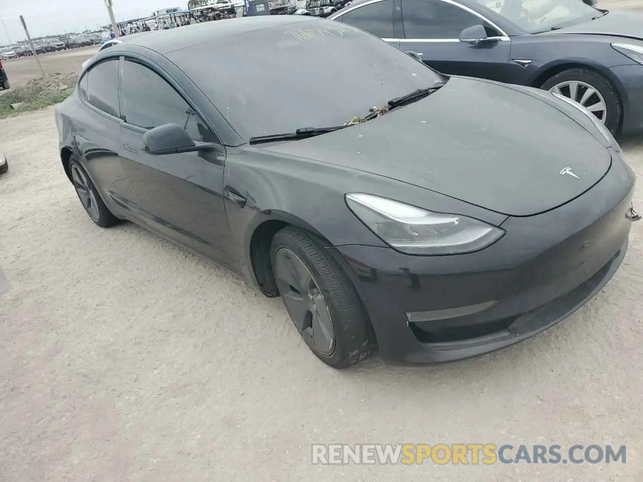 4 Photograph of a damaged car 5YJ3E1EA1NF191944 TESLA MODEL 3 2022