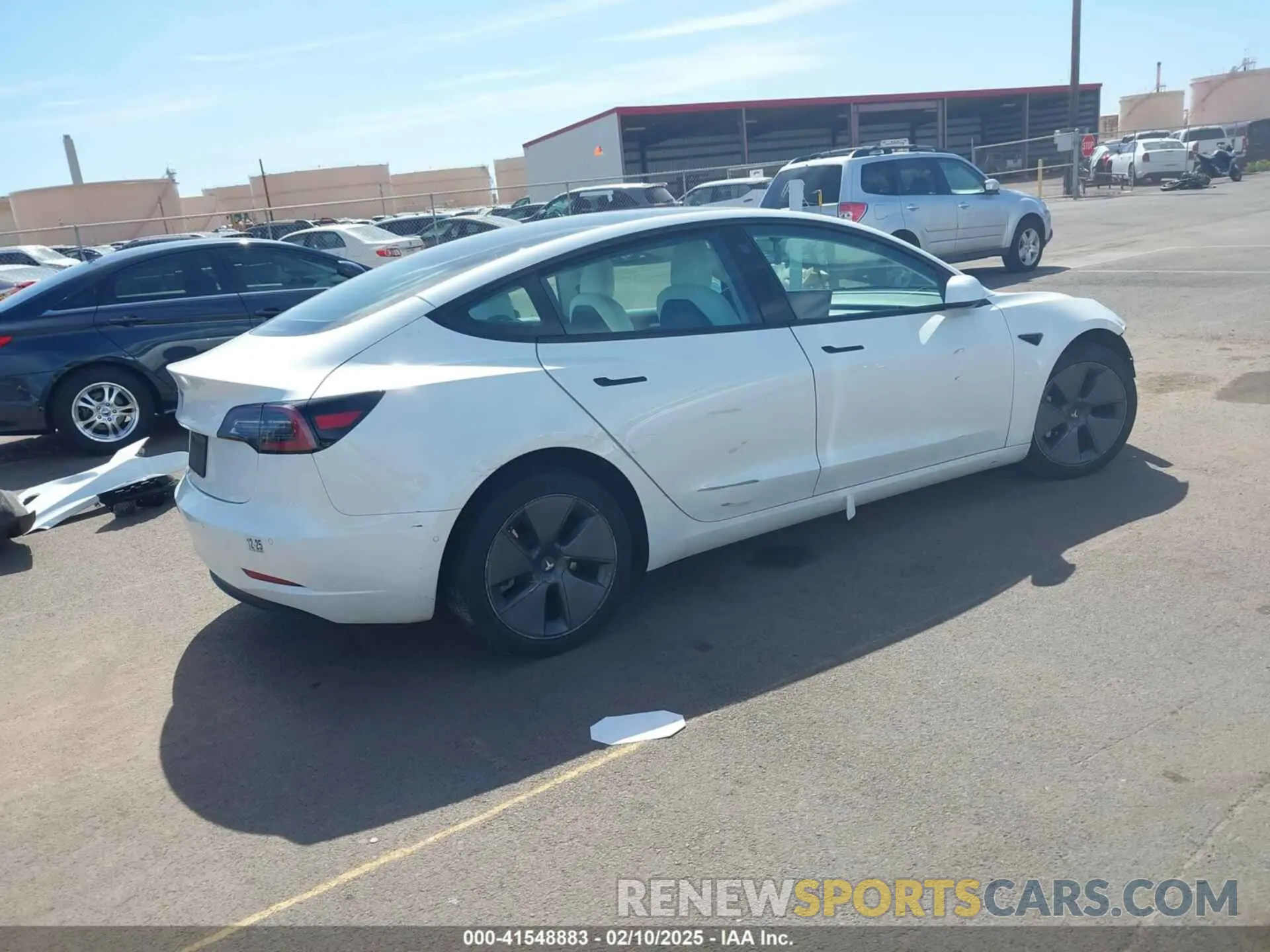 4 Photograph of a damaged car 5YJ3E1EA1NF241533 TESLA MODEL 3 2022