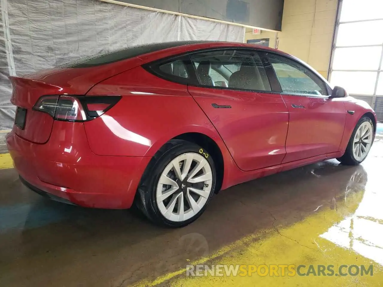 3 Photograph of a damaged car 5YJ3E1EA1NF303965 TESLA MODEL 3 2022
