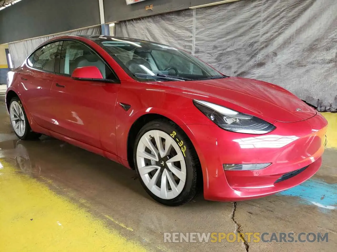 4 Photograph of a damaged car 5YJ3E1EA1NF303965 TESLA MODEL 3 2022