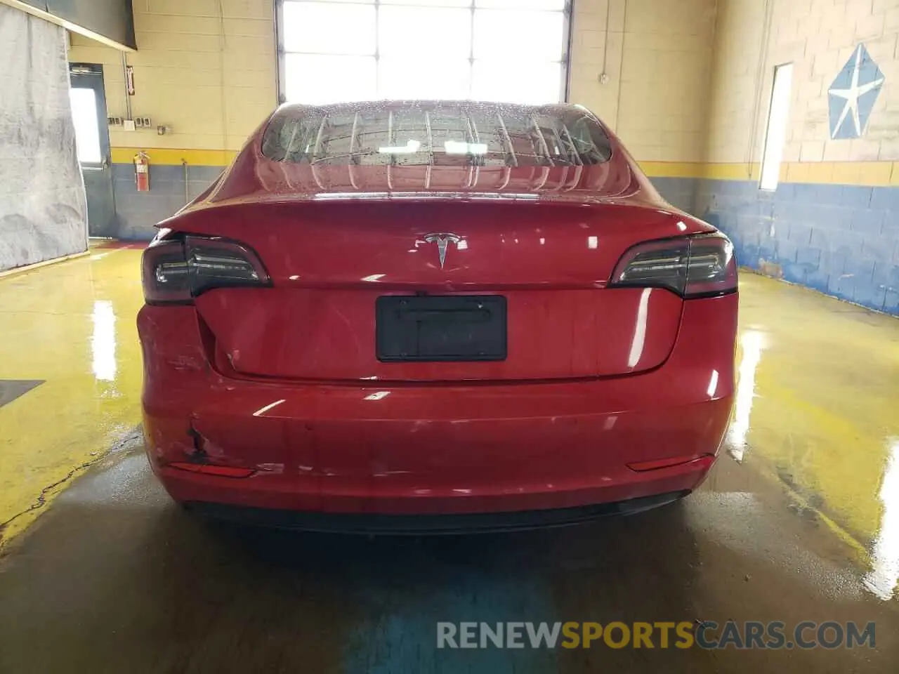 6 Photograph of a damaged car 5YJ3E1EA1NF303965 TESLA MODEL 3 2022