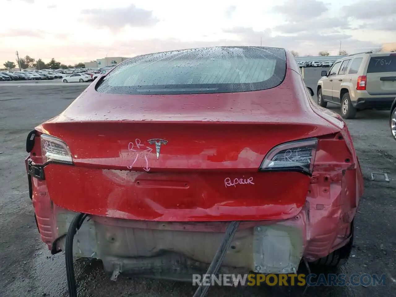 6 Photograph of a damaged car 5YJ3E1EA1NF304128 TESLA MODEL 3 2022