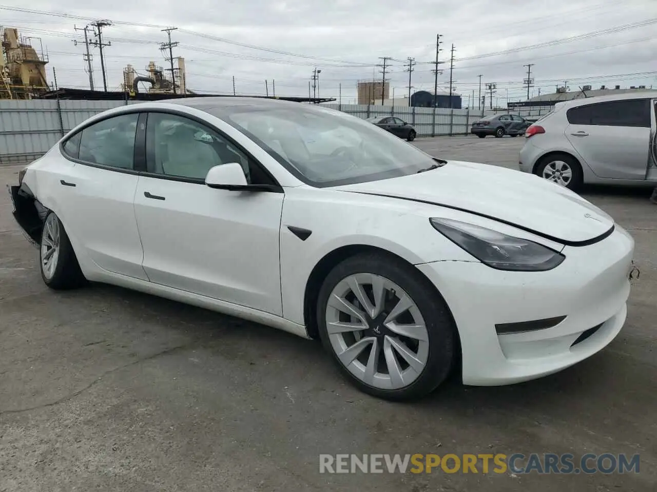 4 Photograph of a damaged car 5YJ3E1EA1NF313024 TESLA MODEL 3 2022