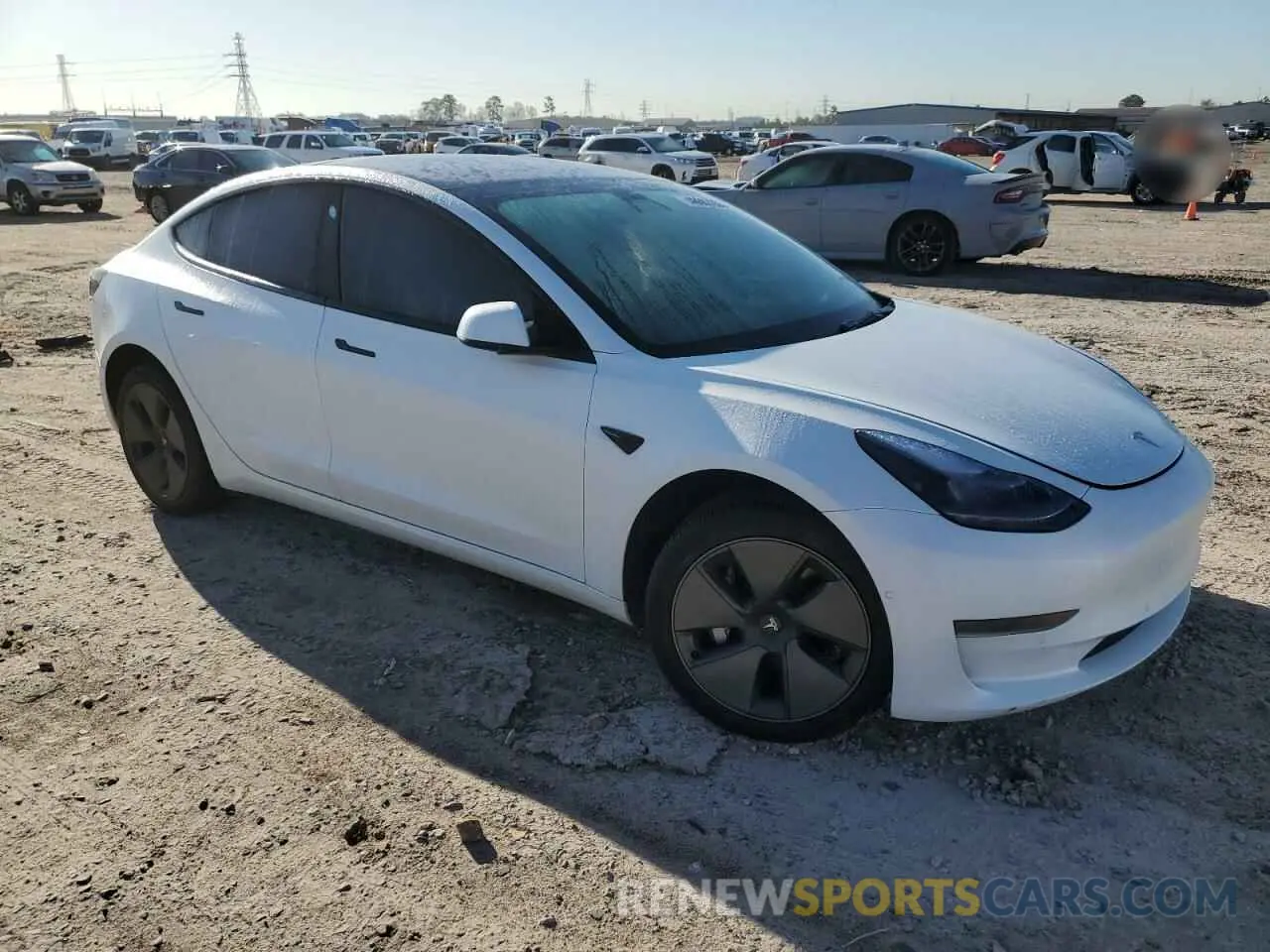 4 Photograph of a damaged car 5YJ3E1EA1NF314836 TESLA MODEL 3 2022
